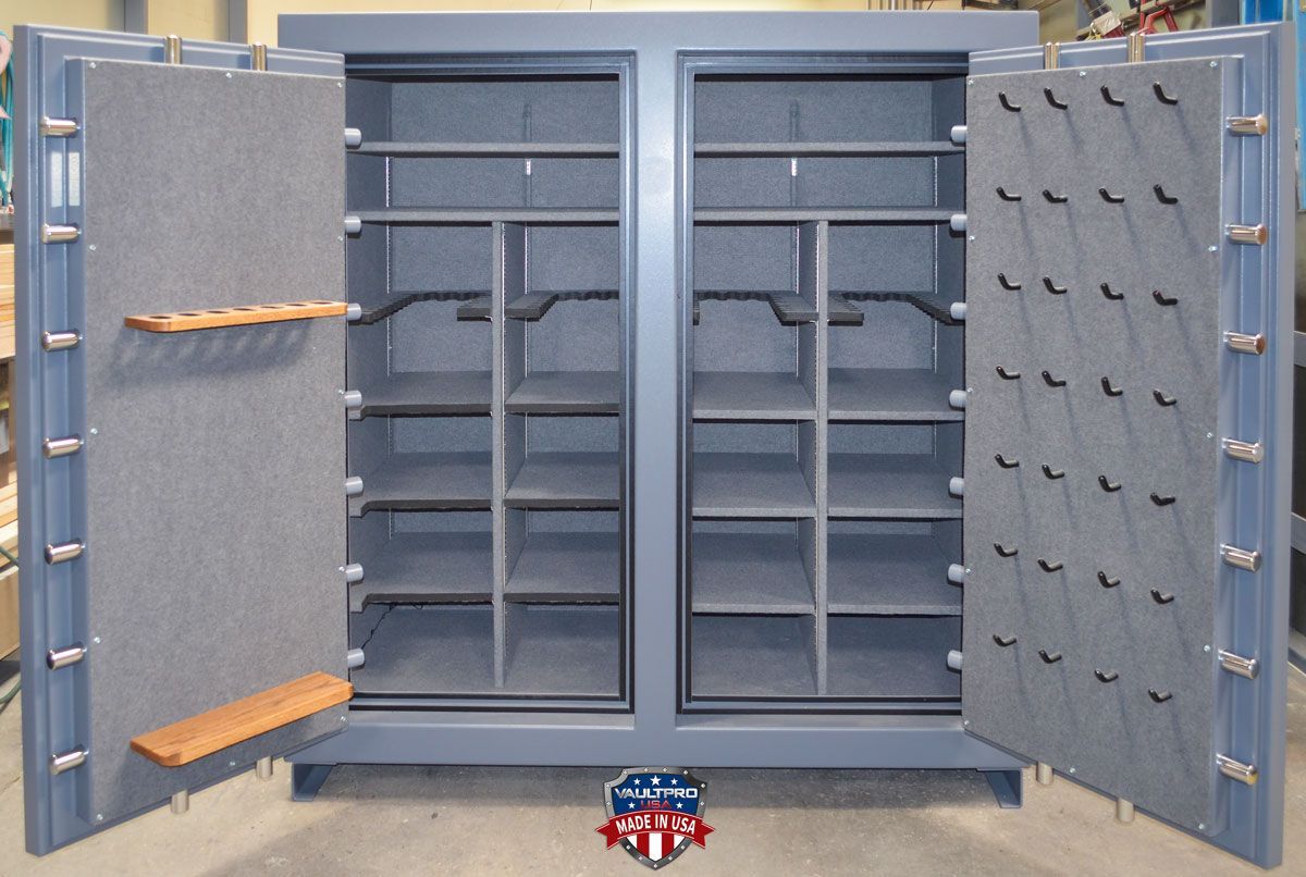 large double door safe with moveable and removable shelves. long gun door rack and pistol peg handgun holders on door backs.