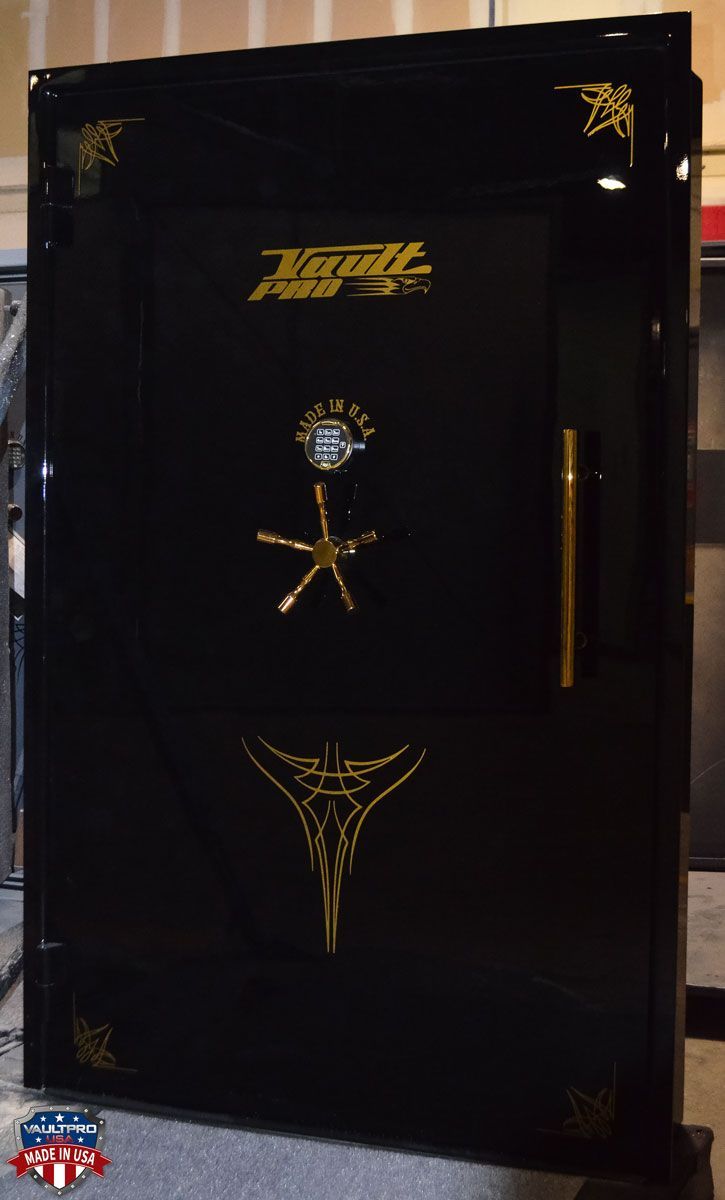 Image of custom Elite vault door 80x50 inch size, finished in premium gloss black with gold pinstripe and hardware. Made in America by Vault Pro USA