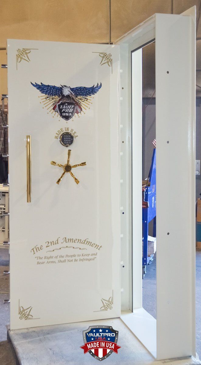 Executive model vault door, in-swinging with custom 2nd Amendment art, gloss white finish and gold trim.