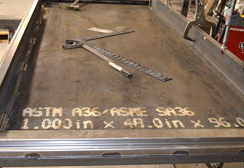Steel plate for vault door assembly