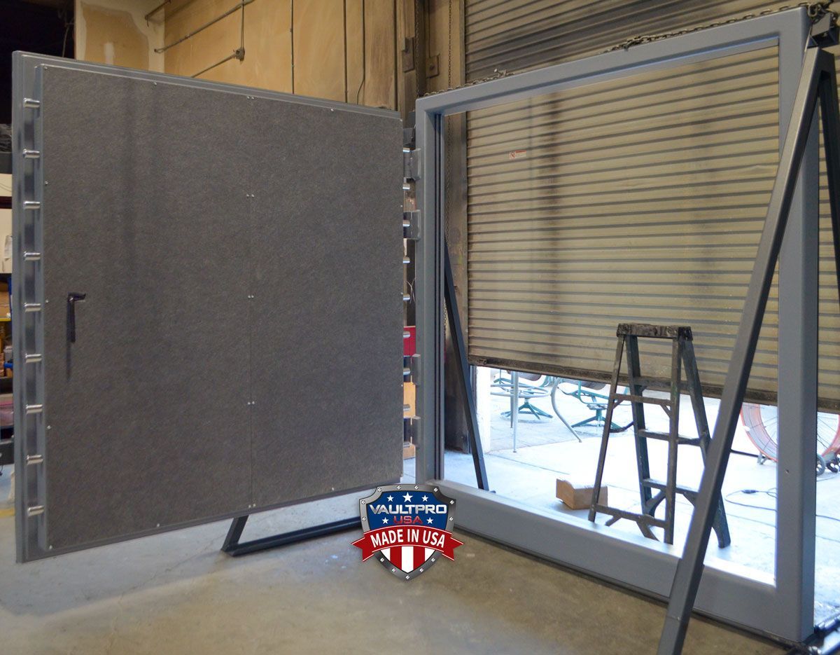 A very large heavy duty vault door with four 20000lb rated hinges. Custom vault door made in America by Vault Pro USA.