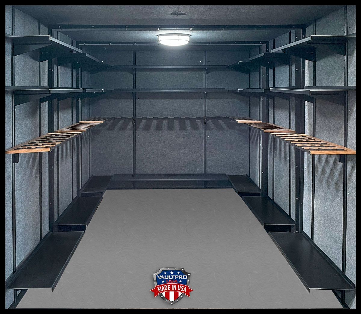 Modular vault rooms with gun racks and weapons storage rack mounted on safe door.