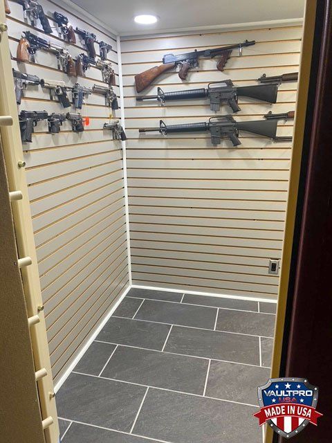 Modular walk in vault room interior with gun racks.