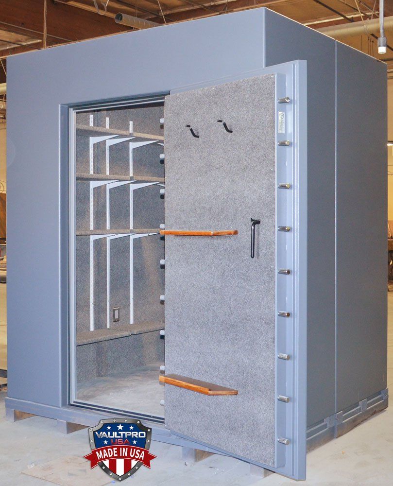 Walk-in Vault Room and Shelter Safe Room with door mounted gun rack and pistol peg handgun holders.
