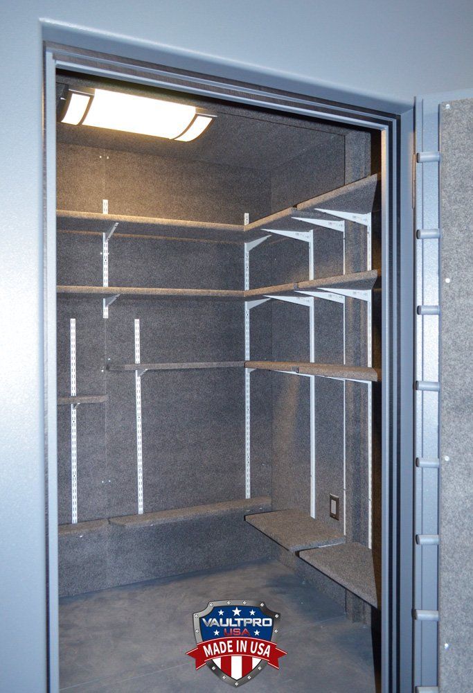 Walk-in Vault Room and Shelter Safe Room with door mounted gun rack and interior shelves.