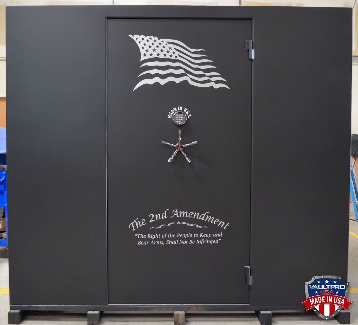 walk-in gun vault room with American flag and 2nd Amendment art