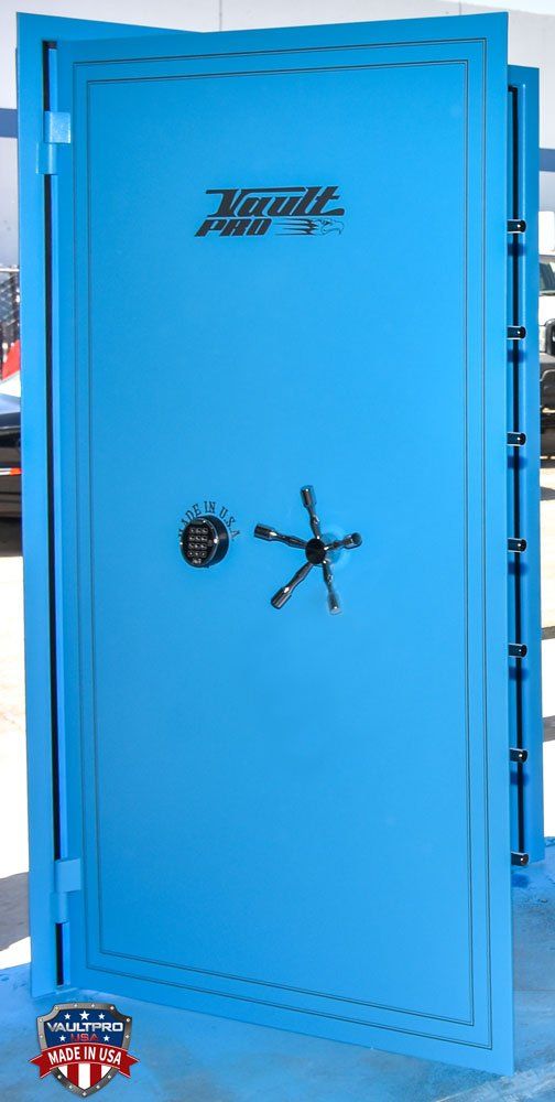 Wide vault door made ADA compatible with low threshold and low height lock and handle.