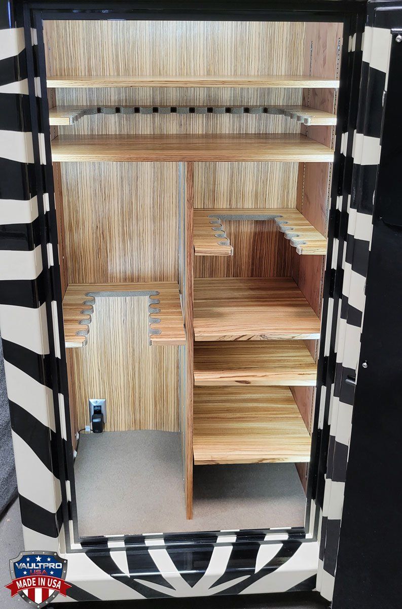 Custom Triple DoCustom safe with Zebra paint scheme exterior and custom zebra wood interior, made in USA by Vault Proor Safe Interior Can Be Modifed in Any Way.