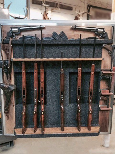 Custom safe interior with gun racks.