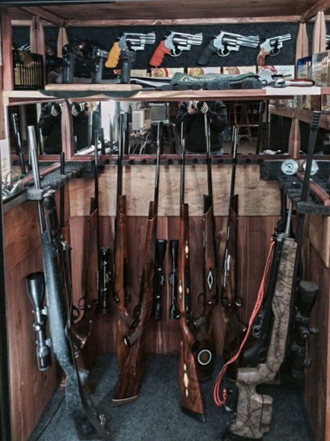 Custom safe interior with custom handgun holders.