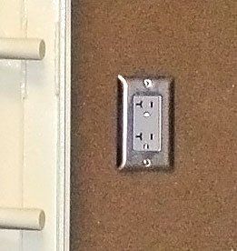 Electrical outlet for safes and shelters