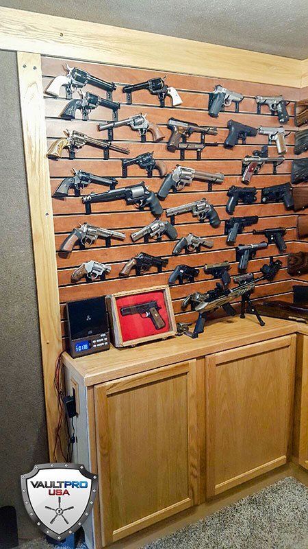 Custom pistol racks and oak cabinetry..