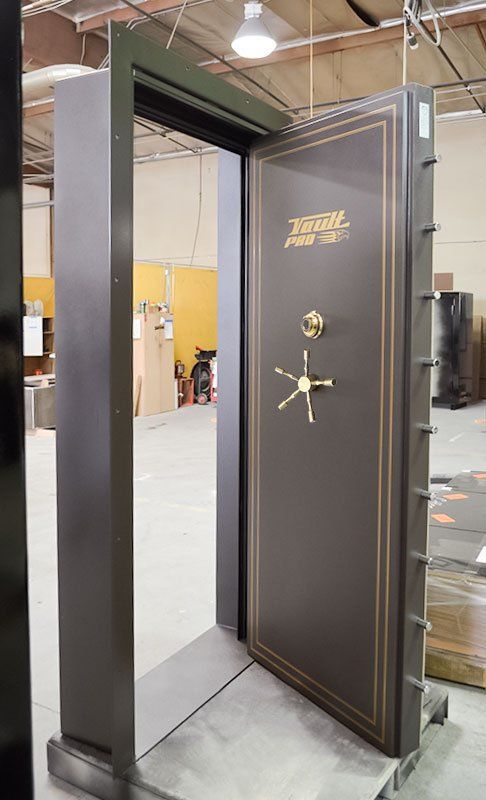 In-swing Hinged Elite Series Vault Door & frame built to match the existing opening.