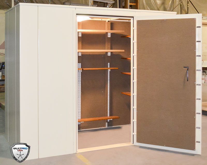 Custom walk in gun room and door with quick internal release.