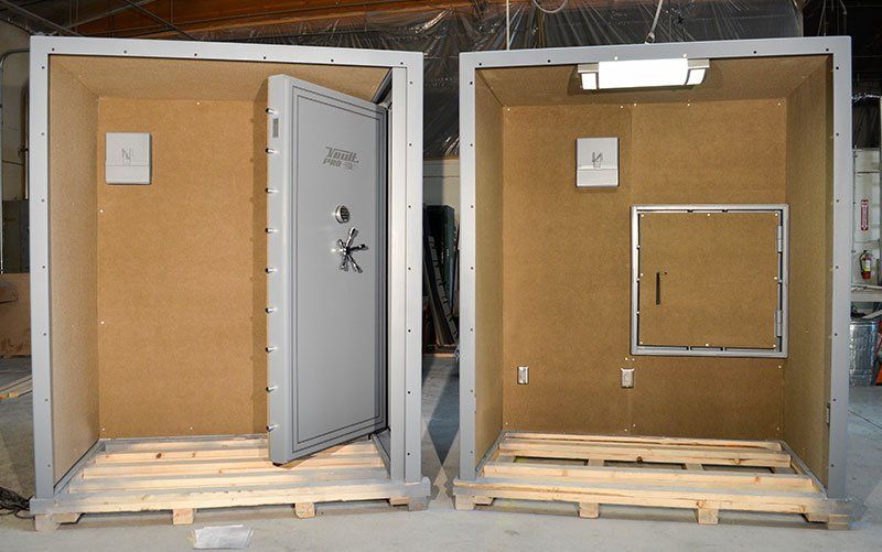 Modular shelter interior with lighting, electrical outlets and ventilation system.