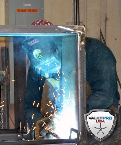 welding and assembling hatch doors for safe rooms and shelters