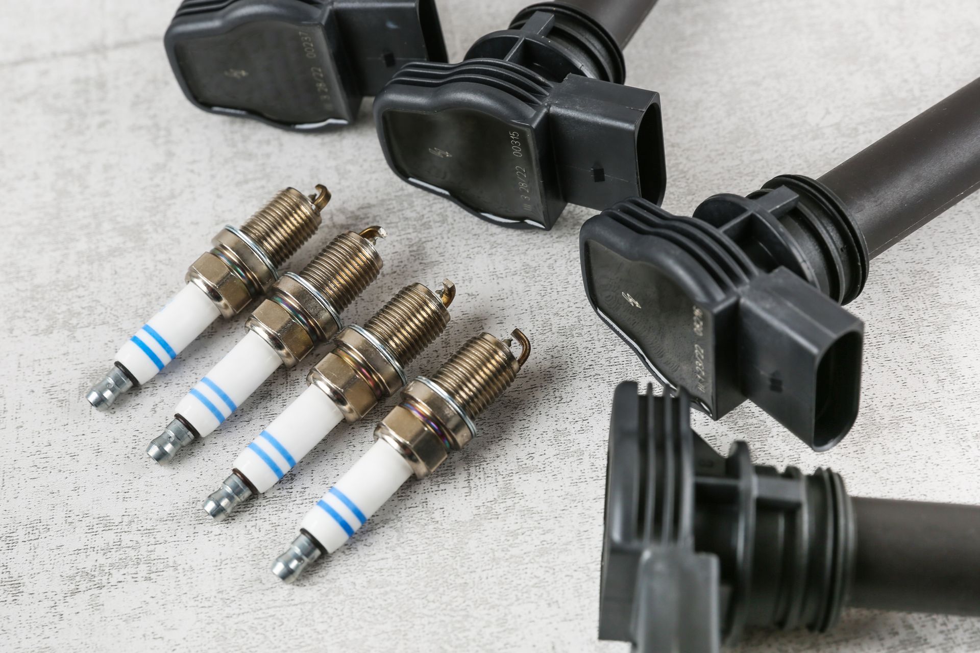 Why Bad Spark Plugs And Ignition Coils Trigger A Check Engine Light | Auto Clinic Care