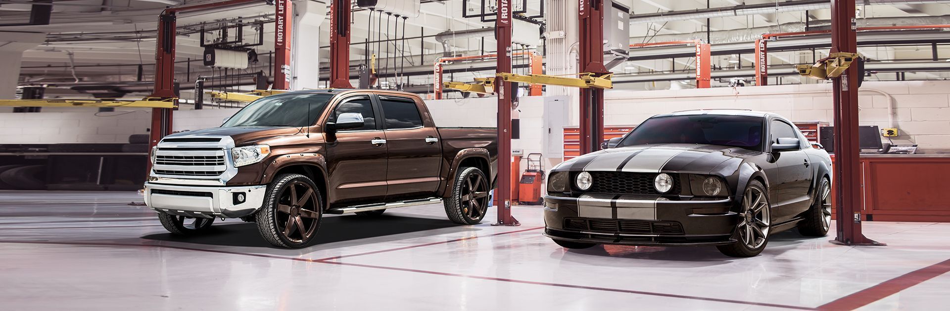 A brown Toyota Tundra pickup truck and a black Ford Mustang in a garage setting. | Auto Clinic Care