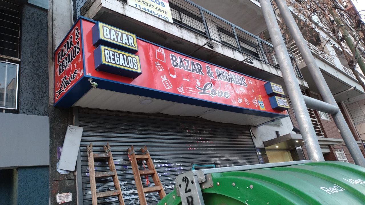 Cartel para frente de local