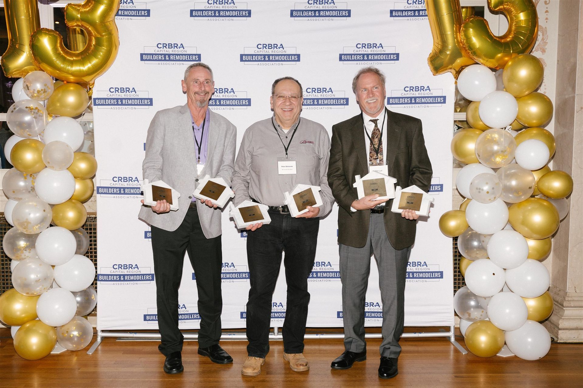 Peter  Belmonte and Mike Lust receiving 6 awards at the 2025 CRBRA Best in Building Awards