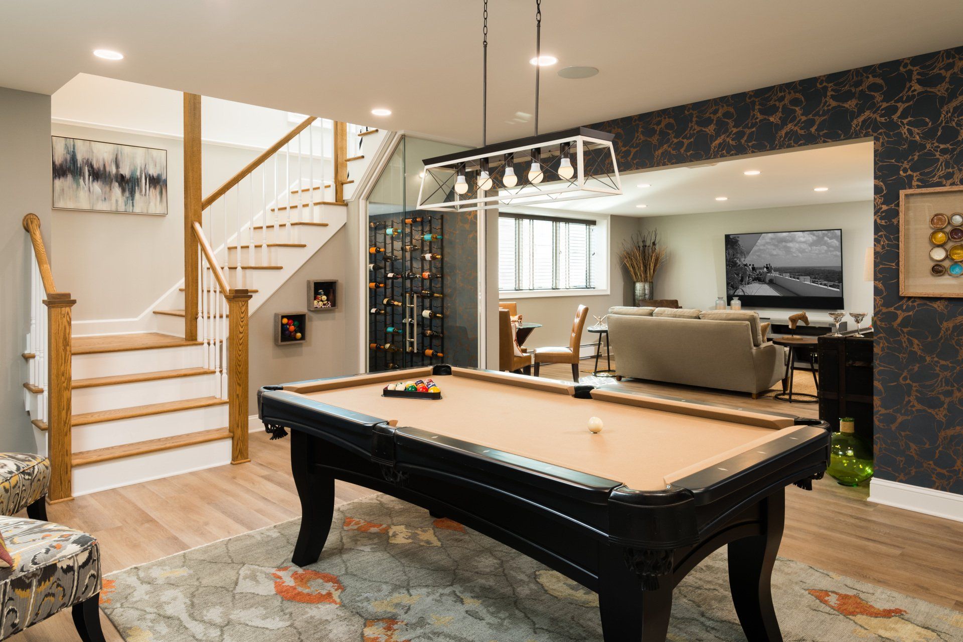 Finished basement with pool table and media room