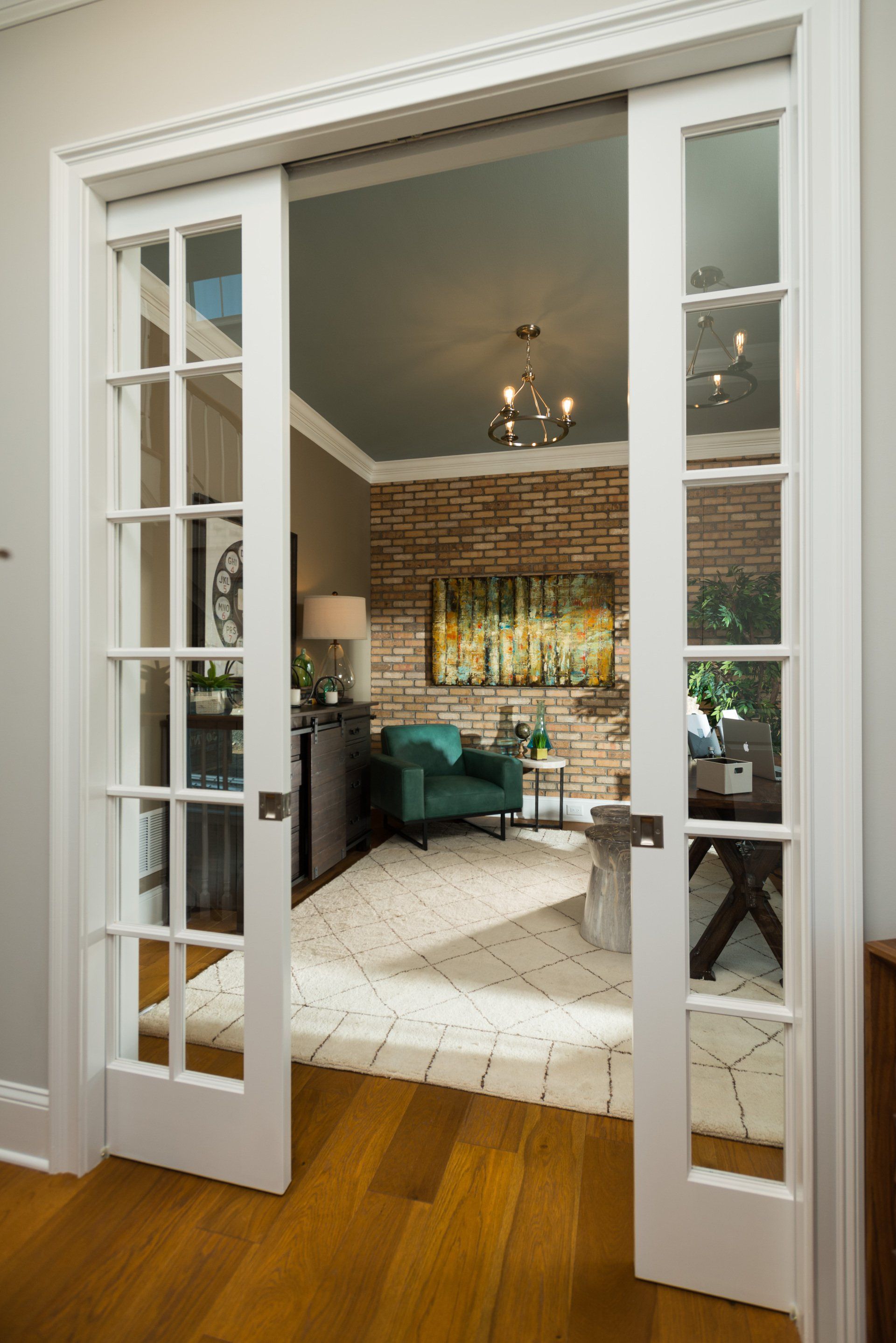 Formal study with elegant French doors off foyer