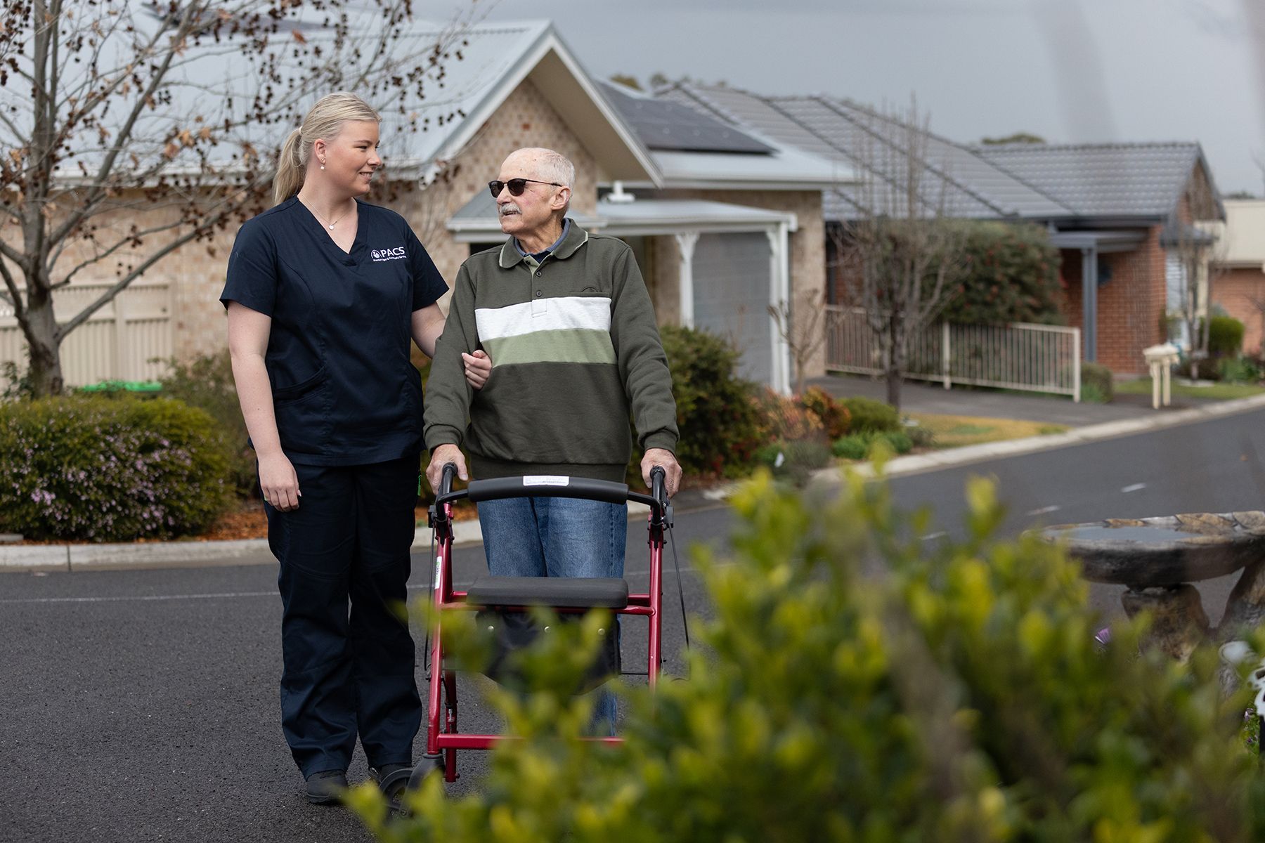 Senior Man in Wheelchair with Happy Caregiver — Aged Care in Tamworth, NSW