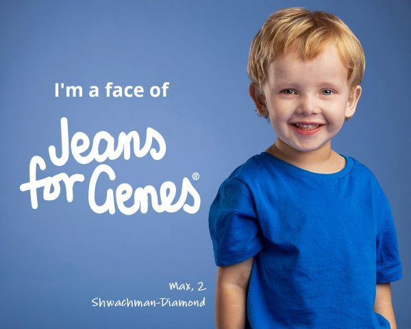 A Young Boy Is Wearing A Blue Shirt That Says I 'm A Face Of Jeans For Genes — Aged Care in Tamworth, NSW