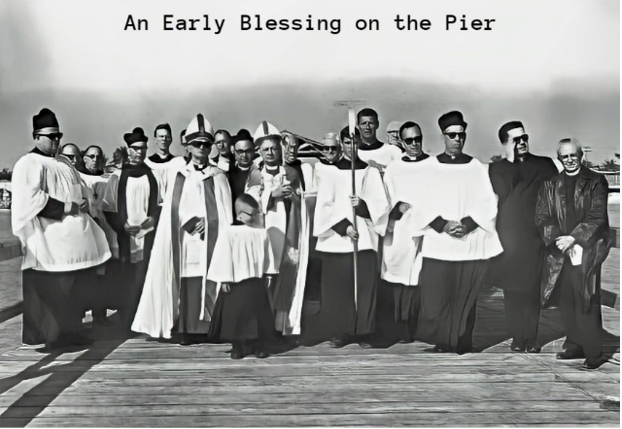 A black and white photo of an early blessing on the pier