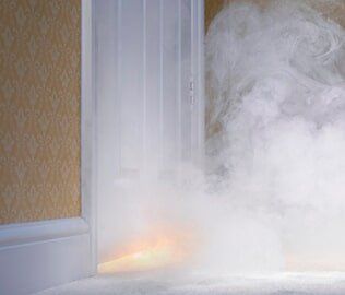 Smoke coming in from under door — Fire Damage Restoration in Neptune, NJ Smoke coming in from under door — Fire Damage Restoration in Neptune, NJ