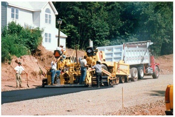 Asphalt Contractor — Worker Fixing Road in Rocky Hill, CT