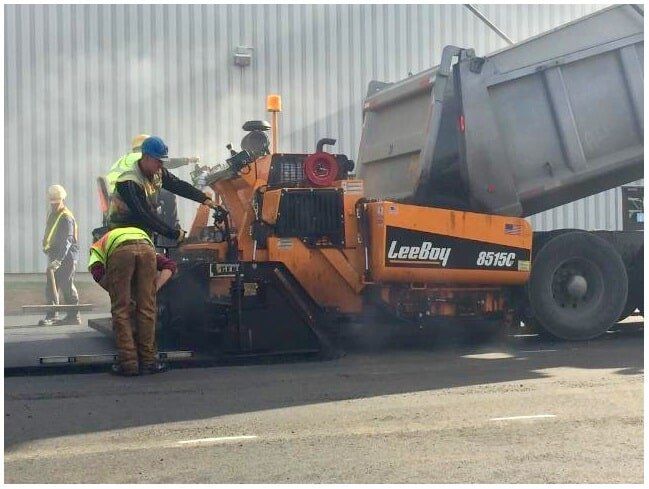 Concrete Patching — Workers Managing Asphalt Truck in Rocky Hill, CT