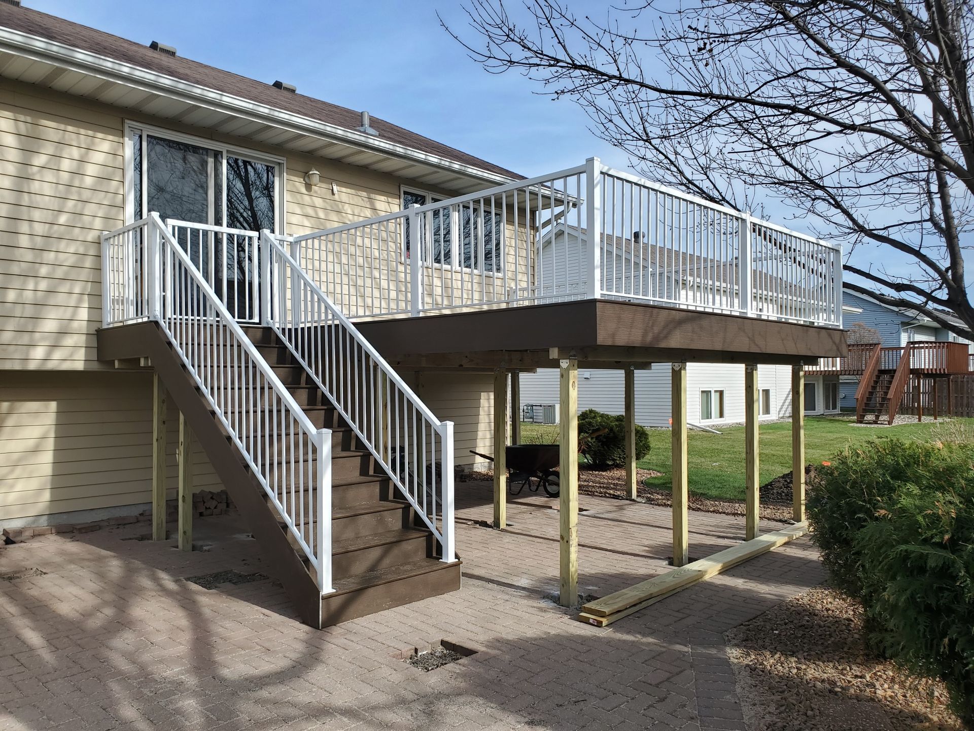 There is a deck with stairs leading up to it.