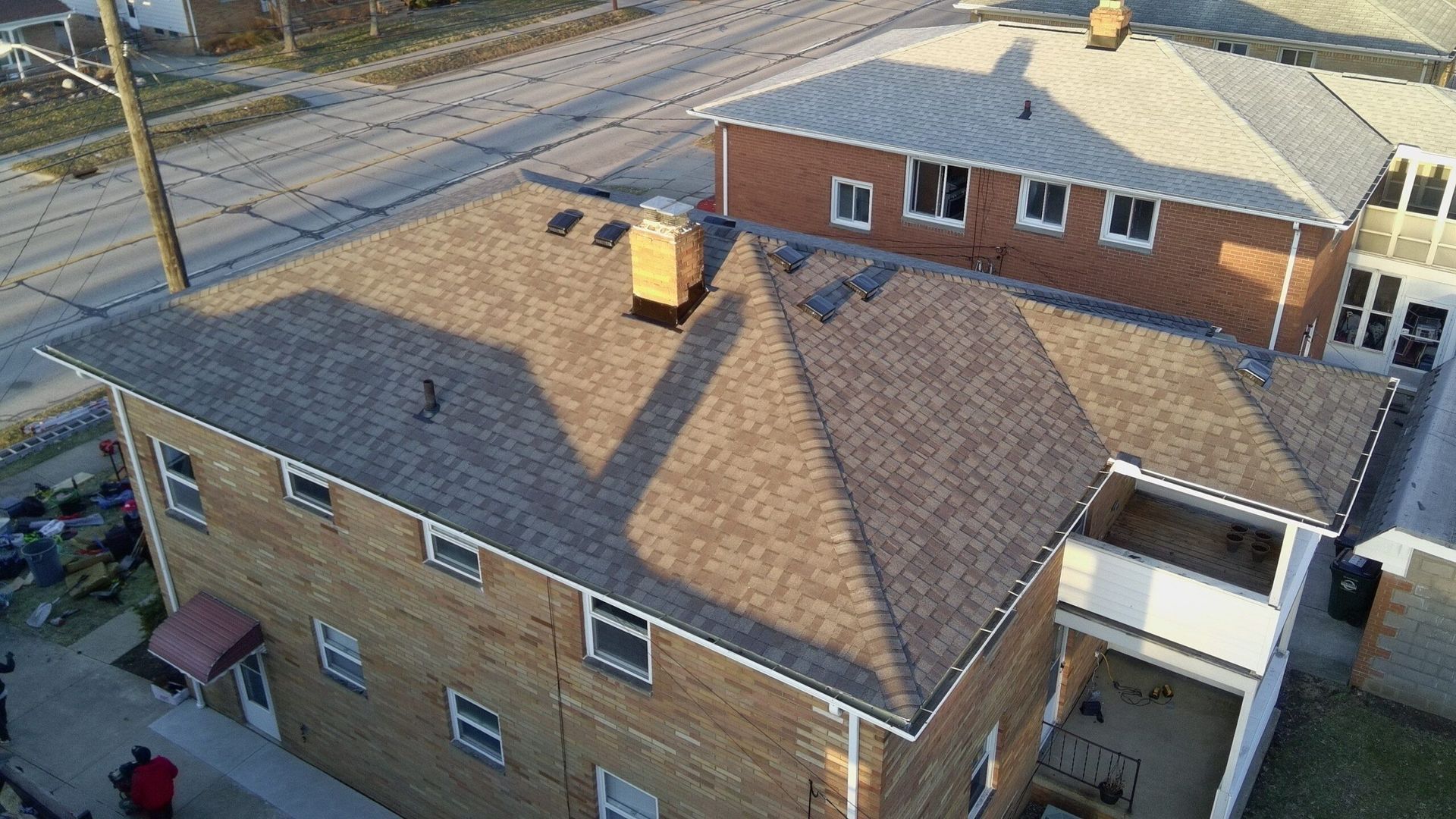 Diamond Roofing Pros replacing old shingles