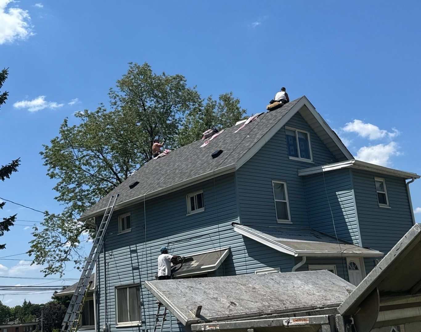 Our team replacing a roof on a home in Kent, Ohio