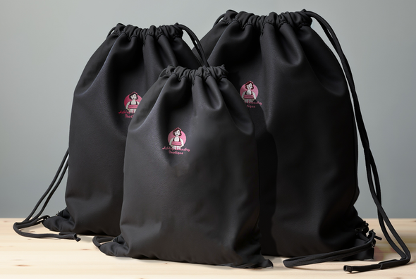 Three drawstring bags with a Ashley's logo embroidered on them