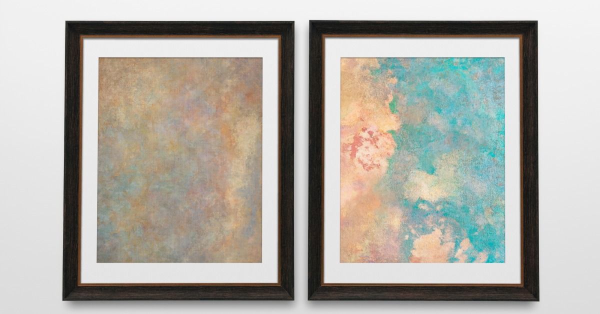 Two paintings with shades of brown and blue have a white mat and a black frame. They're hanging up.
