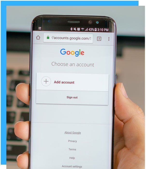 A person is holding a cell phone with the google app open.