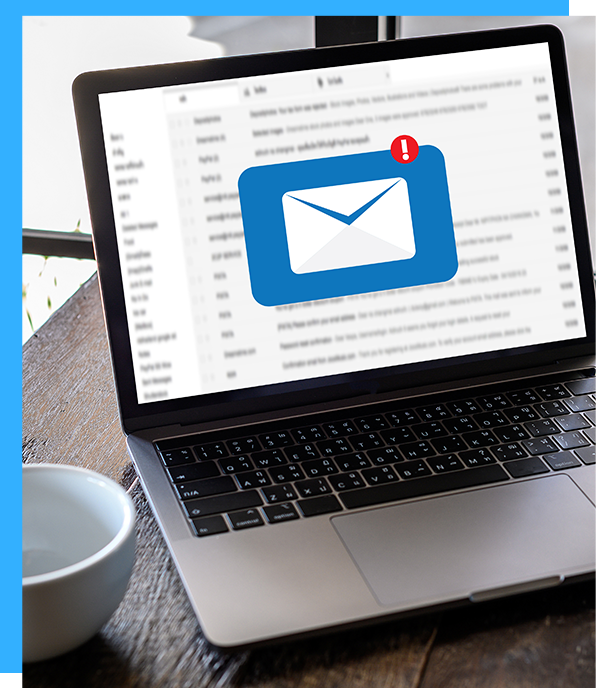 A laptop computer with an envelope on the screen