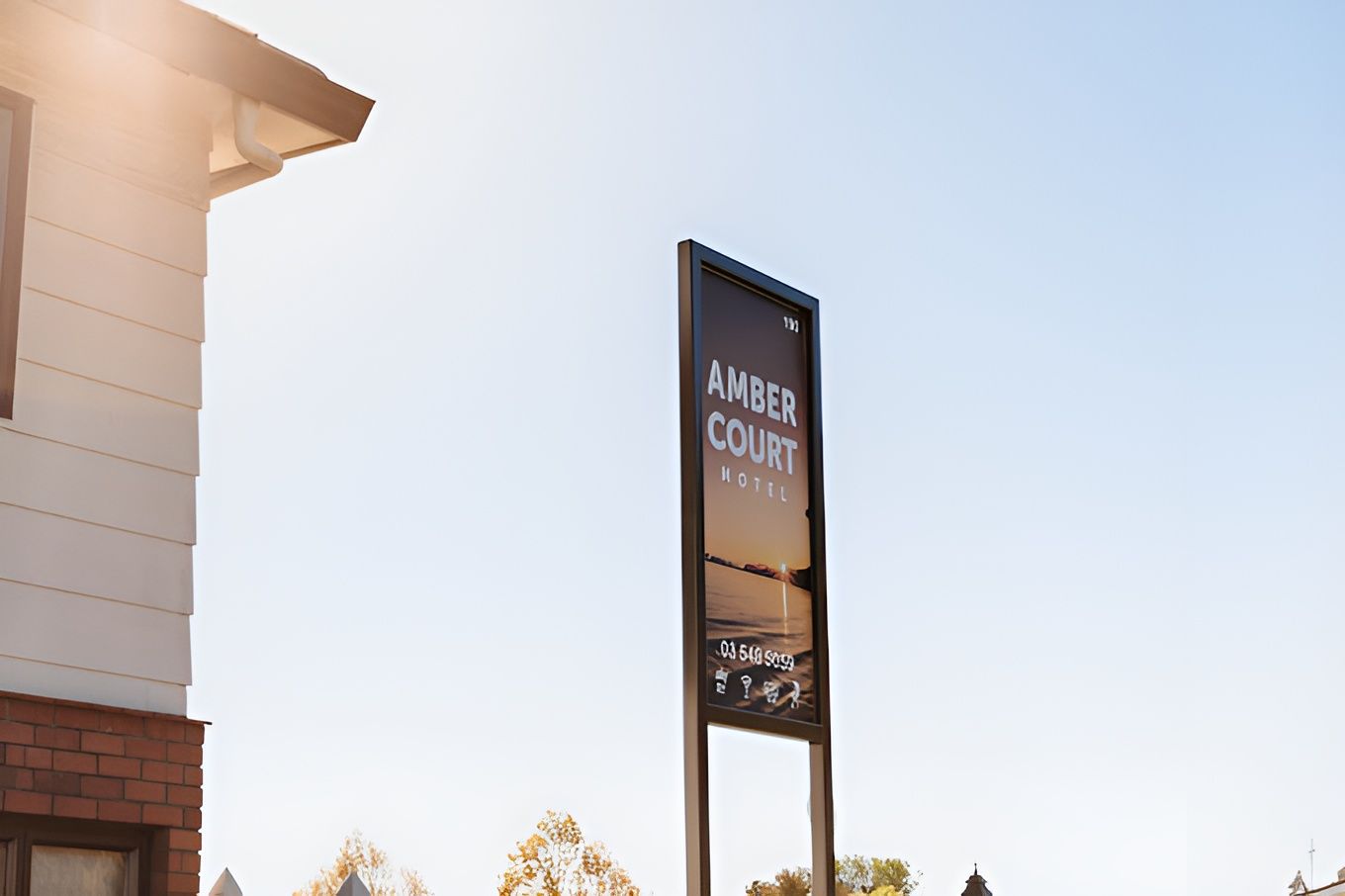 A Lake Surrounded by Mountains and Clouds — Ambercourt Motel in Robina, QLD