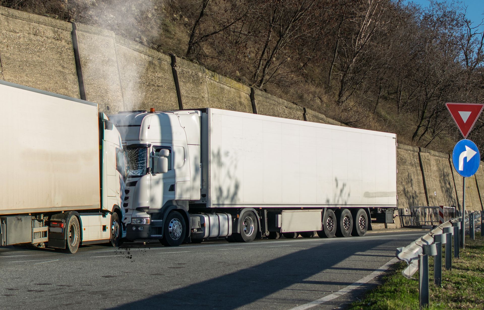 Frontal collision between two trucks.