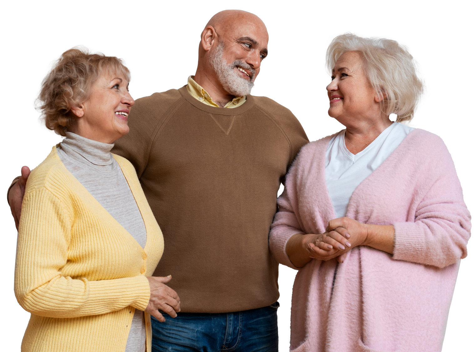 A man and two women are standing next to each other and smiling.