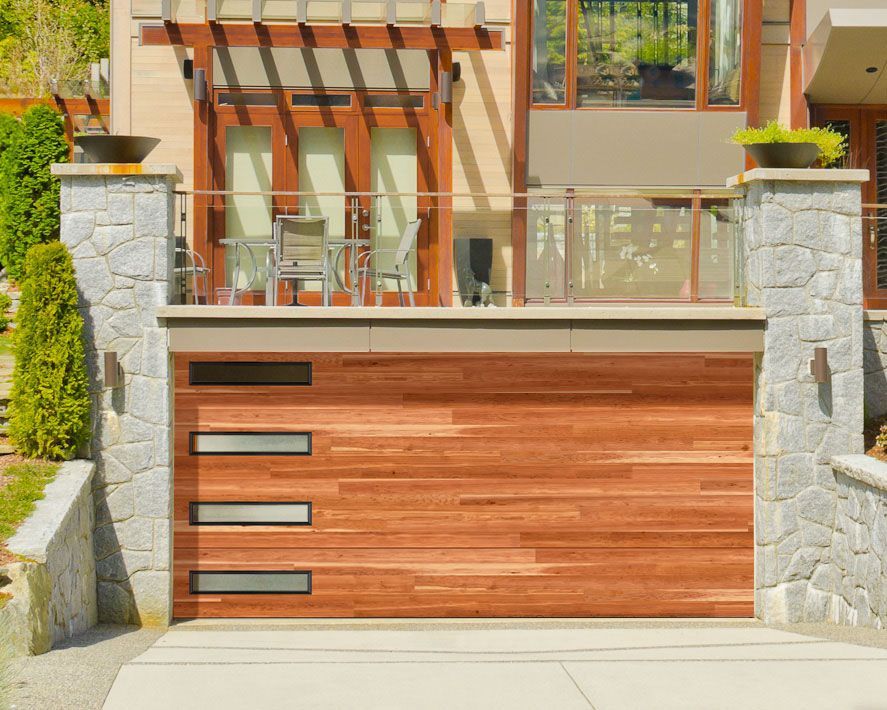 A modern house with a wooden garage door