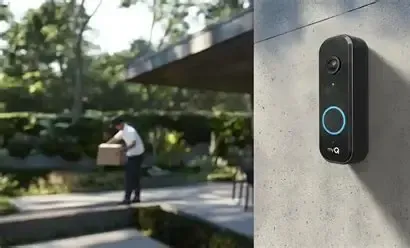 A delivery person placing a box near a house while a doorbell camera is mounted on the wall.