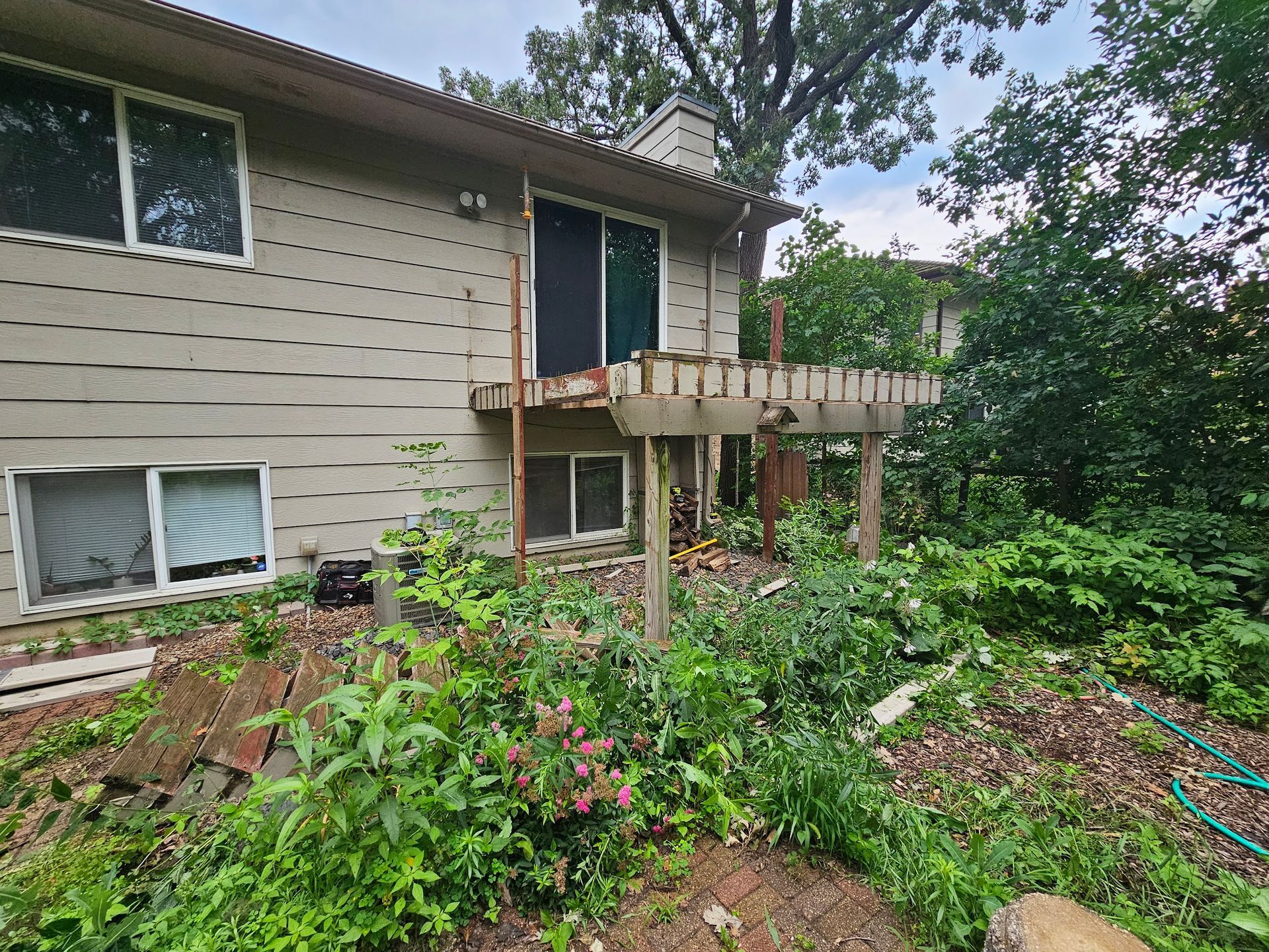 A large building with a balcony and lots of windows