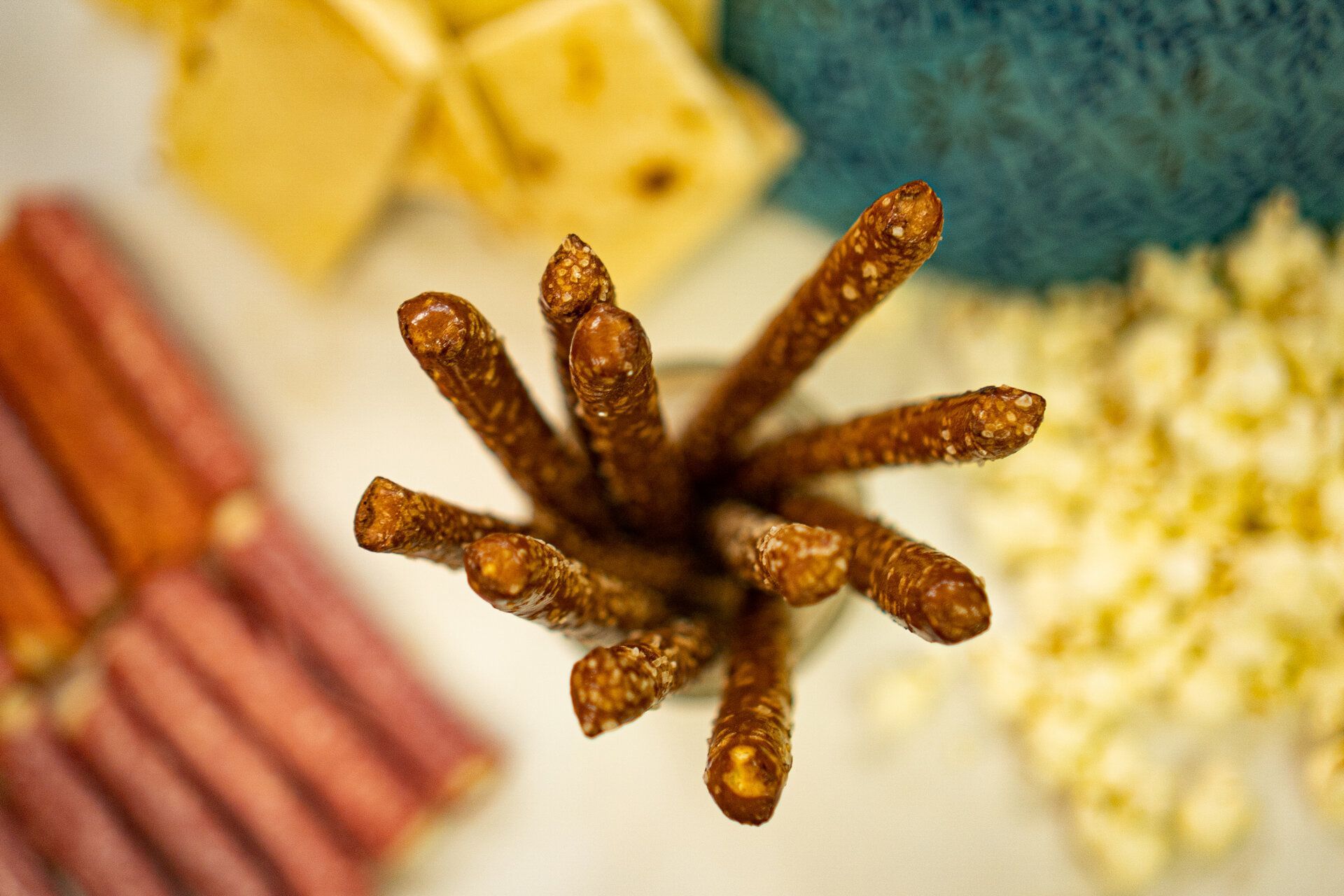 A bunch of pretzel sticks sitting on top of a table.