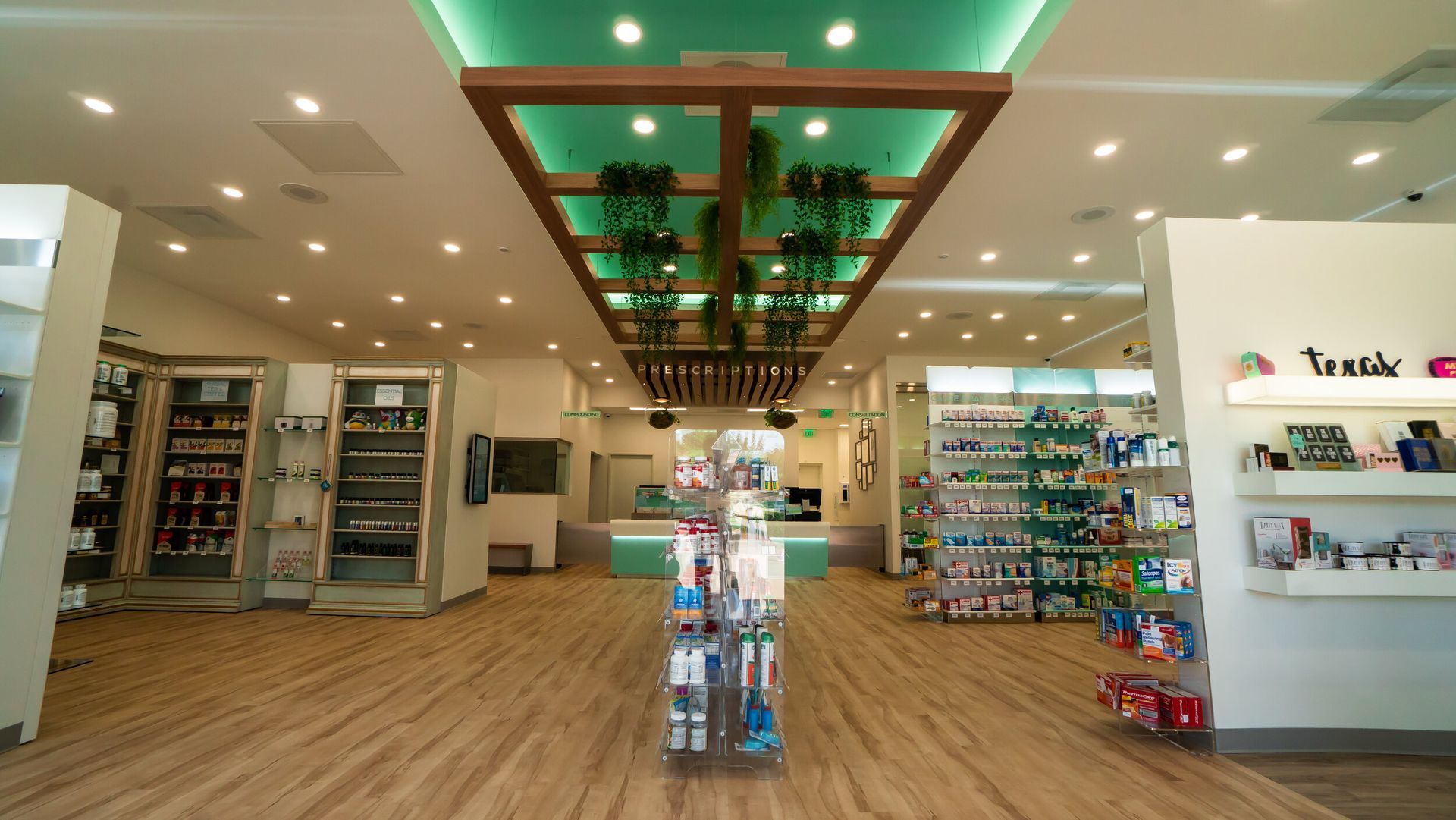 The inside of a pharmacy with a wooden floor and a green ceiling.