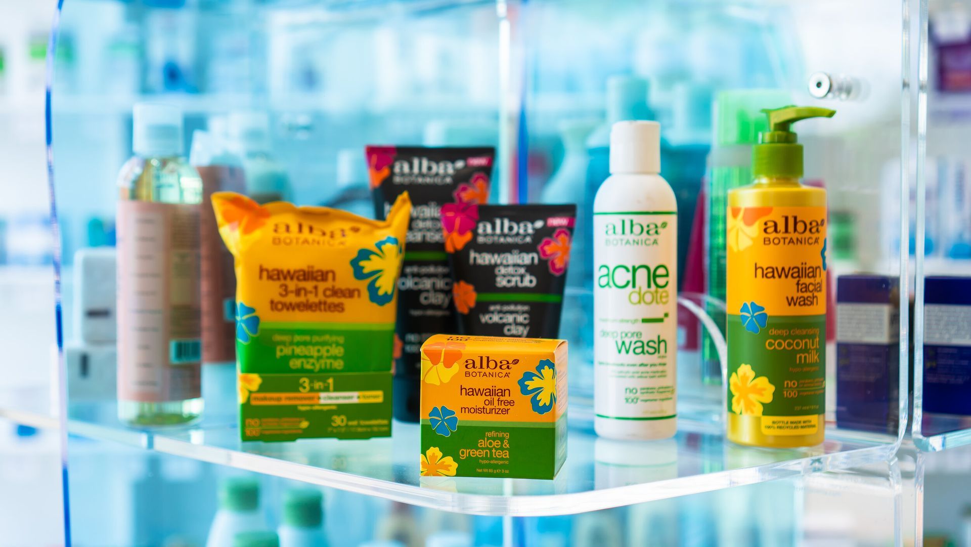 A shelf filled with a variety of cosmetic products.