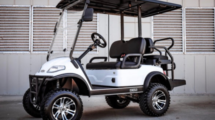 White ICON ECO lifted 4-passenger golf cart