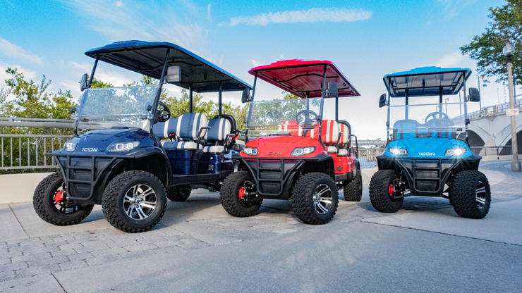 Indigo Blue, Torch Red, and Caribbean Blue 6-passenger lifted golf carts